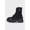 Black boots with leather inserts