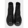 Black boots with leather inserts