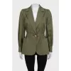 Green fitted jacket with a button