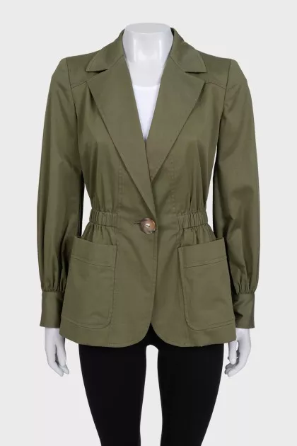 Green fitted jacket with a button