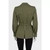Green fitted jacket with a button