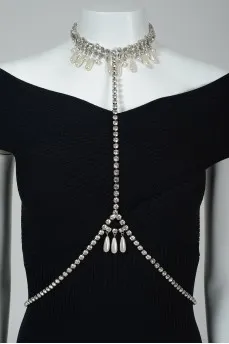 Necklace with stones and beads on the neck and waist