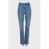 Blue jeans with zippered pockets