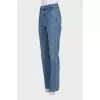 Blue jeans with zippered pockets
