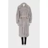 Fitted fur coat with a belt