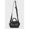 Bag with a wicker pen