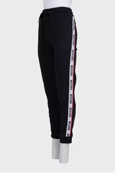 Sweatpants with a signature print