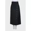 Black skirt decorated with buttons