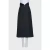 Black skirt decorated with buttons