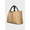 Tote made of combined material
