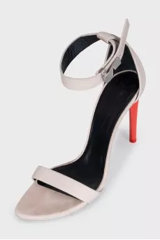 Gray sandals with red heels