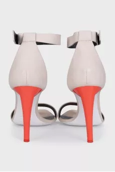 Gray sandals with red heels