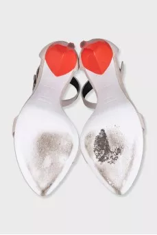 Gray sandals with red heels