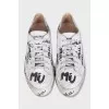 Sneakers with a distressed effect