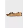 Golden leather moccasins