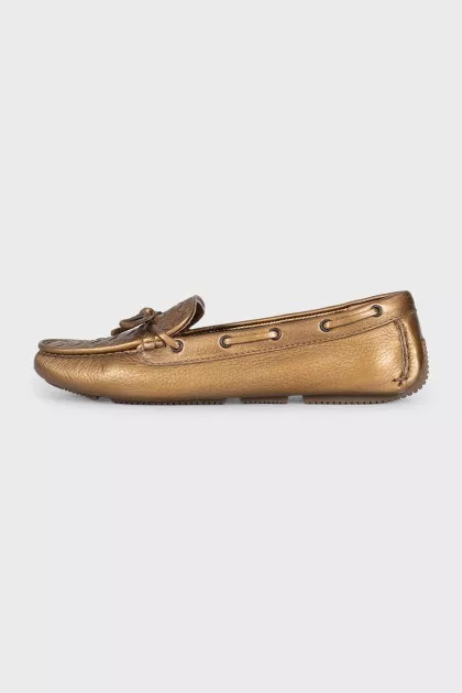 Golden leather moccasins