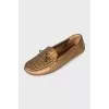Golden leather moccasins