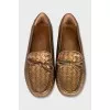 Golden leather moccasins