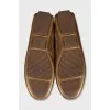 Golden leather moccasins