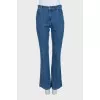 Blue boot cut fit jeans with embroidered pockets