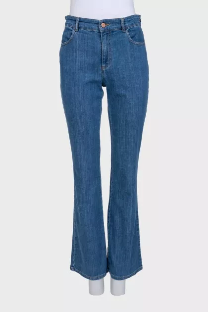 Blue boot cut fit jeans with embroidered pockets