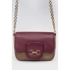 Handbag with a long chain handle