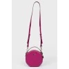 Round handbag on a long strap