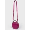 Round handbag on a long strap