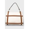 Bag with brown trim