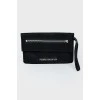 Clutch with zip and wrist handle