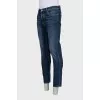 Men's blue straight-leg jeans with buttons