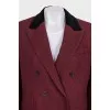 Red double-breasted jacket with tag