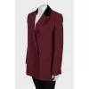 Red double-breasted jacket with tag