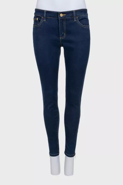 Blue skinny jeans with a zipper
