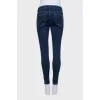 Blue skinny jeans with a zipper