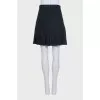 Black pleated skirt with tag