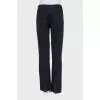 Black wide leg fit jeans with raw seams
