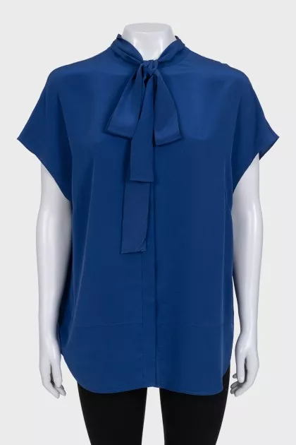 Sleeveless silk blouse with buttons