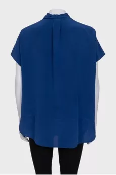 Sleeveless silk blouse with buttons