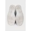 Suede sneakers with a decorated toe