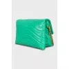 Green shoulder bag with a heart
