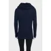 Blue jumper with a puff collar