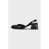 Black leather square toe slingbacks