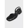 Black leather square toe slingbacks