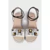White sandals with rhinestones and studs