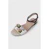 White sandals with rhinestones and studs