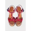 Red sandals with a figured wedge heel