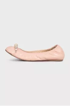 Pink leather ballet flats with decoration
