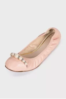 Pink leather ballet flats with decoration