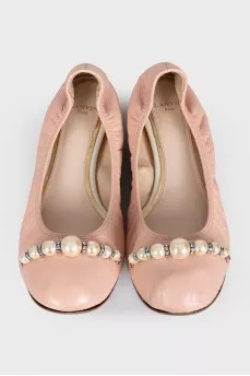 Pink leather ballet flats with decoration